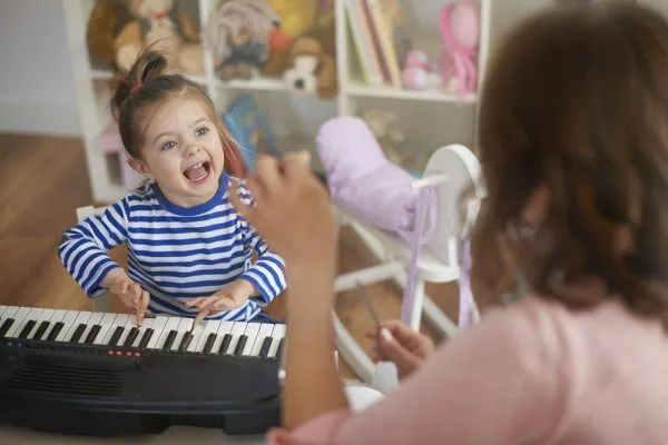 How does music boost language development?